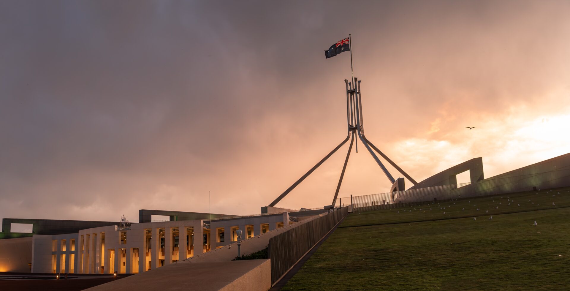 Parliament,House,,Canberra,,Australia,During,Sunset,With,Thick,Clouds