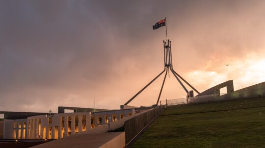 Parliament,House,,Canberra,,Australia,During,Sunset,With,Thick,Clouds